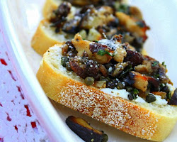 Bruschette with capers, anchovies, and olives