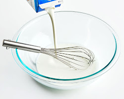 Fermented milk being transferred to a serving bowl