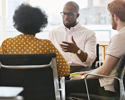 group of people discussing AI ethics